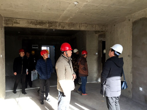 天工公司土建四部神木新村神南華府27、28#樓順利通過竣工驗收