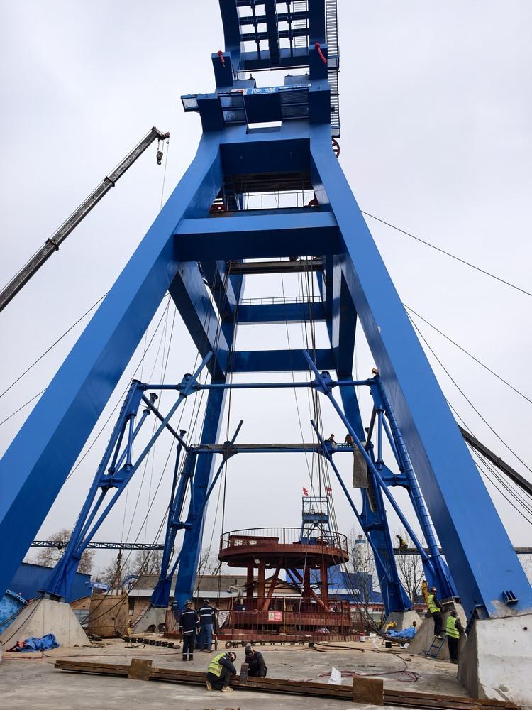 陜煤建設(shè)礦建二公司：創(chuàng)新工藝 永久井架套臨時(shí)鑿井井架施工提效保安全